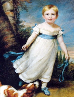 3 year old in white muslin with blue sash and shoes